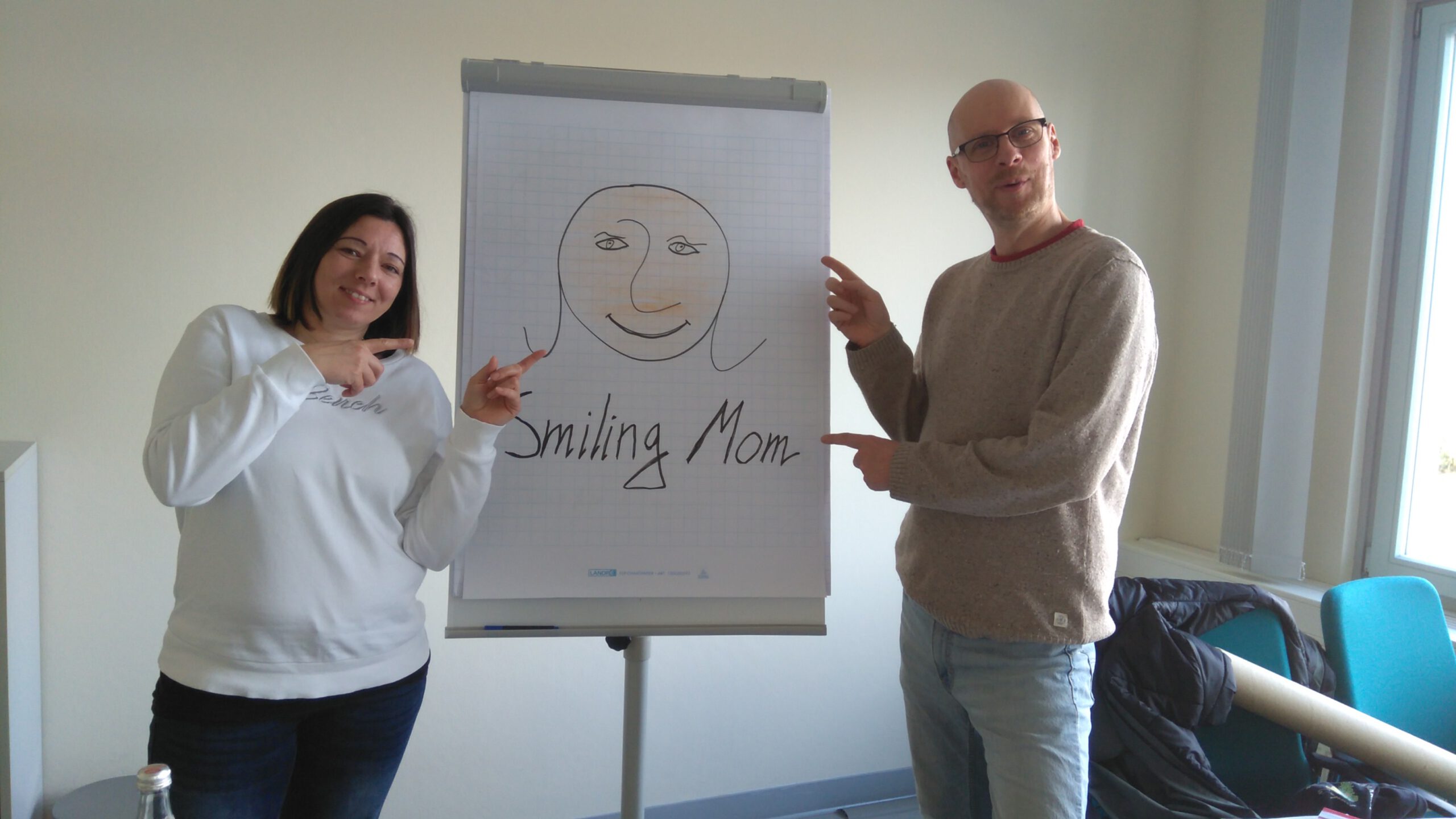 Smiling Mom Logo